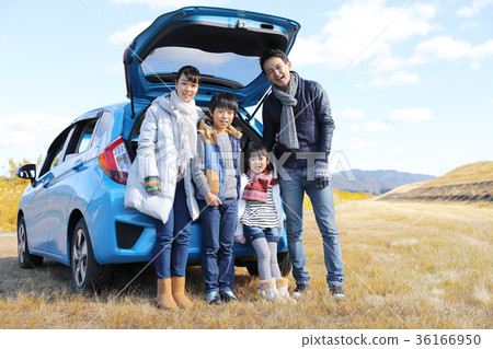 Driving young family Driving young family 36166950