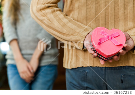 man making surprise to his wife on valentine's day 36167258