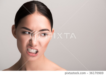 Young woman is expressing irritation 36170989