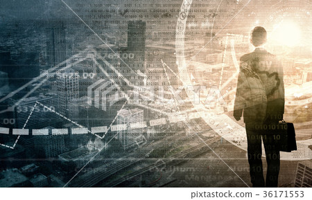 Businessman facing sunrise 36171553