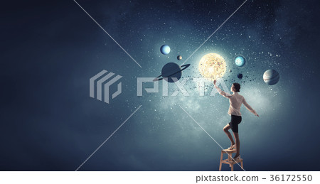 Businesswoman reaching success 36172550