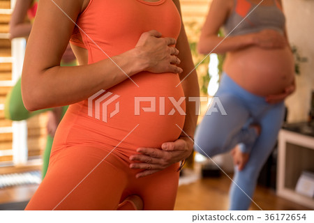 Big with child ladies doing yoga Big with child ladies doing yoga 36172654