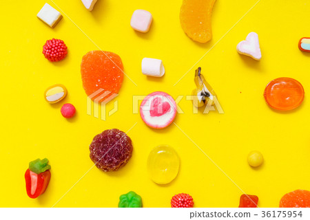 colorful candy on the yellow background 36175954