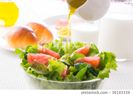 Salad and olive oil Salad and olive oil 36183339