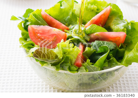 Salad and olive oil Salad and olive oil 36183340