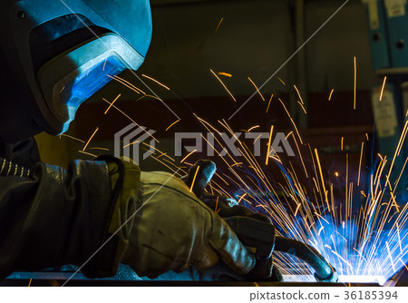 Industrial steel welder in factory Industrial steel welder in factory 36185394