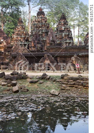 Banteay Srey Temple ruins (Xth Century) on a suns Banteay Srey Temple ruins (Xth Century) on a suns 36185751