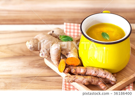 a cup of Turmeric Tea with lemon and ginger  36186400