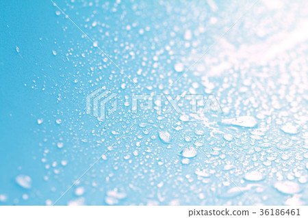 rain water drops on blue sponge surface  36186461