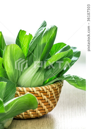 close up the Fresh baby green bok choy in basket 36187503