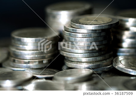 Close up silver money coin stacking on dark  36187509