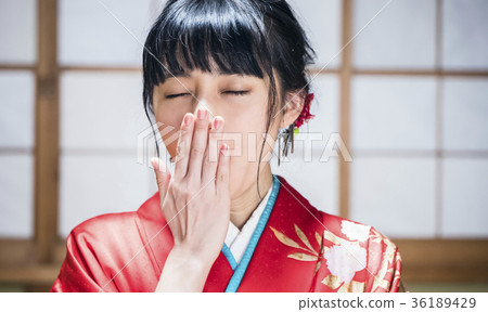 Yawning kimono woman 36189429