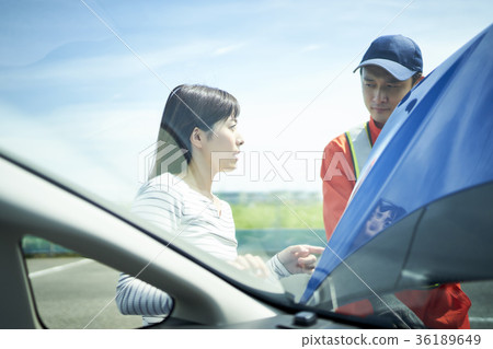 Driver calling the road service 36189649