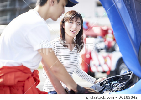 Driver calling the road service 36189842