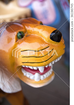 Plastic tiger on a carousel Plastic tiger on a carousel 36190745