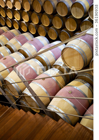 Wine barrels in a cellar 36190938