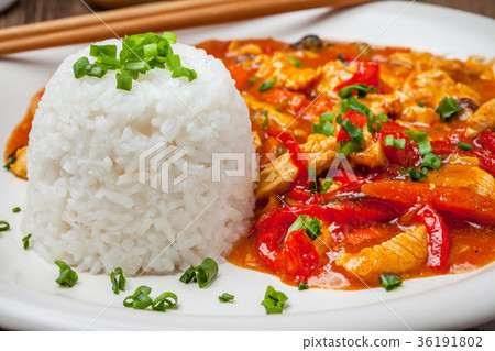 Chinese chicken with vegetables and rice. Chinese chicken with vegetables and rice. 36191802