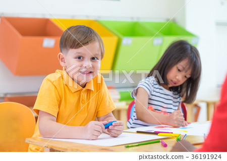 boy kid smiling white learning in classroom 36191924