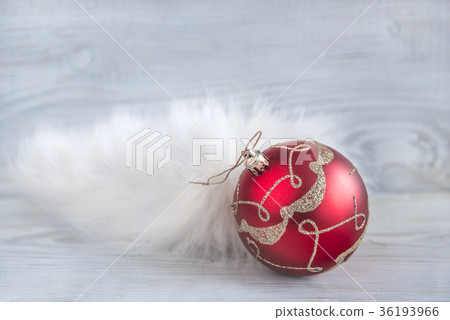 beautiful red christmas ball on white fur  36193966