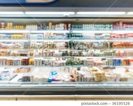 Blurred colorful supermarket products on shelves 36195526