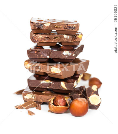 Chocolate pieces isolated on white background Chocolate pieces isolated on white background 36196825