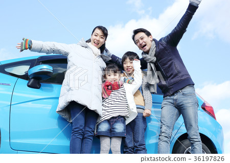 Driving young family Driving young family 36197826