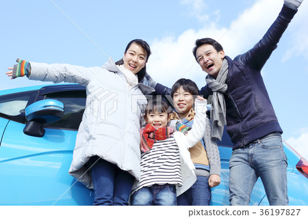 Driving young family Driving young family 36197827