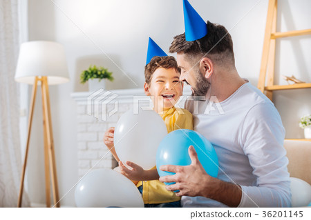 Happy son and father laughing while holding Happy son and father laughing while holding 36201145