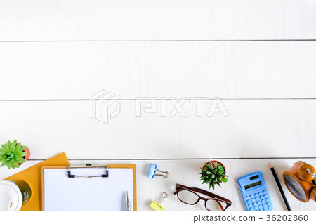 Flat lay office equipment on a white wood desk Flat lay office equipment on a white wood desk 36202860