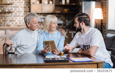 Two cheerful pensioners spending time with their Two cheerful pensioners spending time with their 36203675