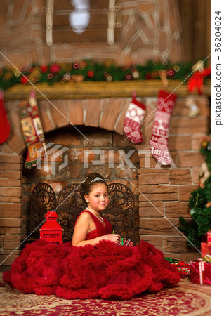 Little winter Princess, girl with Christmas gift 36204024