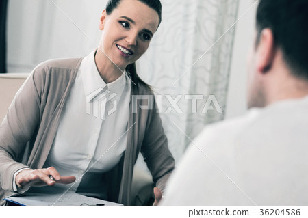 Cheerful female enjoying her profession 36204586