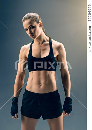 Strong female boxer looking into camera 36204966