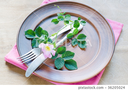 Festive Table setting with pink flowers. Festive Table setting with pink flowers. 36205024