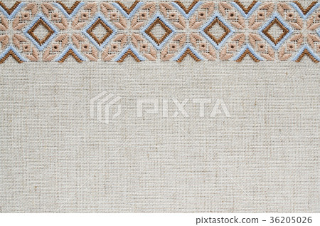 Embroidery design by brown and beige threads. 36205026