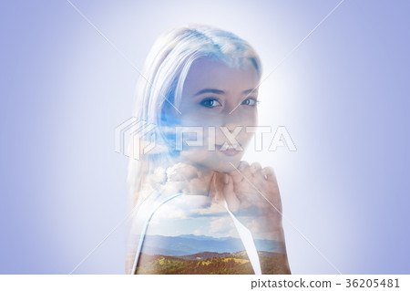 Joyful young woman being in a positive mood Joyful young woman being in a positive mood 36205481