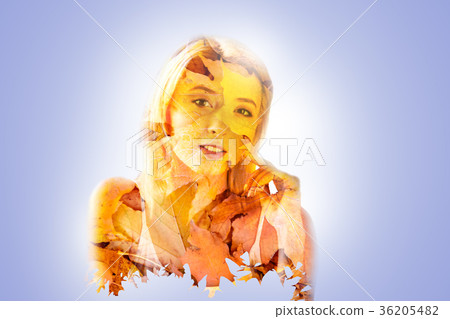 Attractive nice woman enjoying autumn Attractive nice woman enjoying autumn 36205482