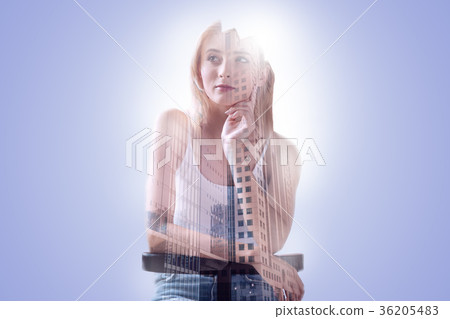 Pleasant thoughtful woman touching her chin Pleasant thoughtful woman touching her chin 36205483