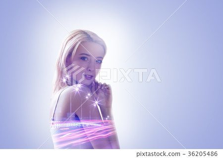 Pleasant attractive woman holding her chin Pleasant attractive woman holding her chin 36205486