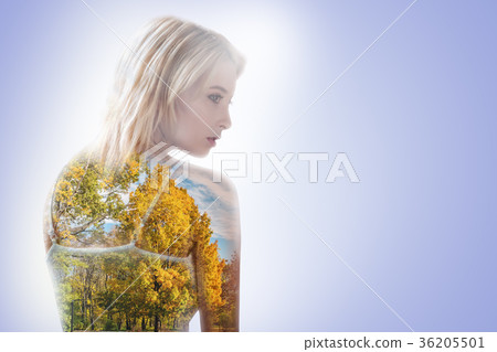 Thoughtful nice woman thinking about nature Thoughtful nice woman thinking about nature 36205501