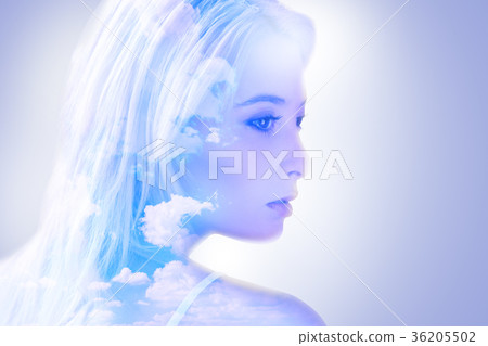 Beautiful blonde woman thinking about the sky Beautiful blonde woman thinking about the sky 36205502