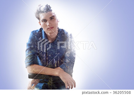 Handsome young man looking at you Handsome young man looking at you 36205508