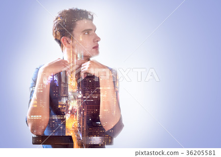 Handsome pleasant man looking aside Handsome pleasant man looking aside 36205581