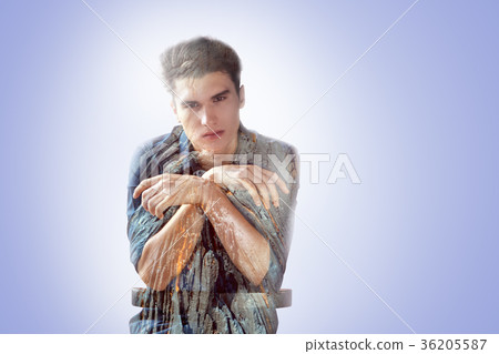 Serious handsome man holding his hands crossed Serious handsome man holding his hands crossed 36205587