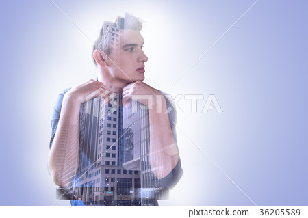 Good looking young man thinking about the city Good looking young man thinking about the city 36205589