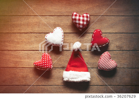 Santa Claus hat and heart shape toys 36207629