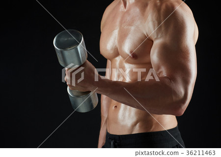 close up of man with dumbbells exercising close up of man with dumbbells exercising 36211463
