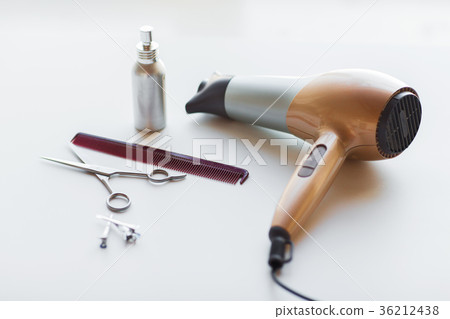 hairdryer, scissors, comb and styling hair spray 36212438