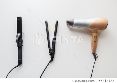 hairdryer, hot styler and curling iron or tongs hairdryer, hot styler and curling iron or tongs 36212522