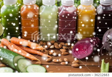 bottles with different fruit or vegetable juices 36212663